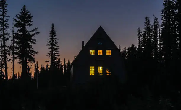 Photo of Cabin in the woods at night