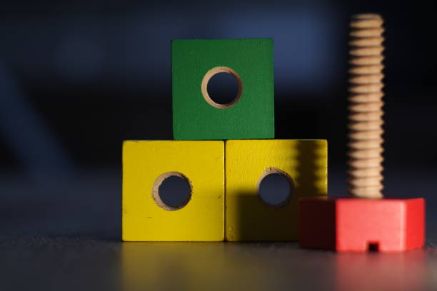 istock colorful wooden screw and nut 1036291712