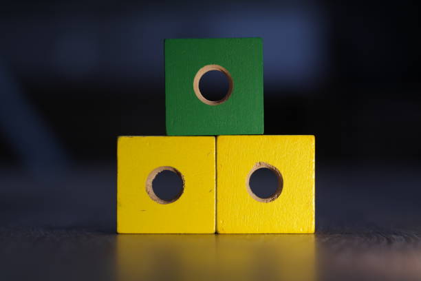 istock colorful wooden screw and nut 1036292278