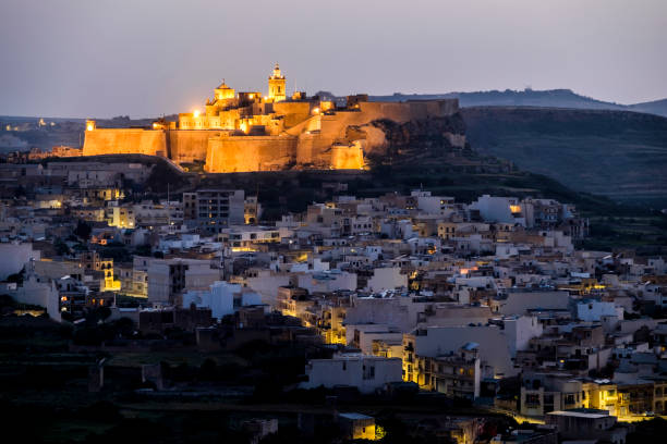 Illuminated Cittadella (Castello) of Victora, Gozo, Malta at dusk