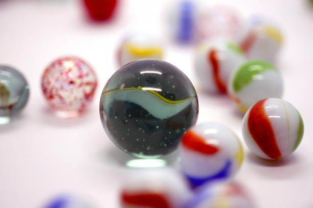 istock dark marble under white and colorful marbles 1036295694