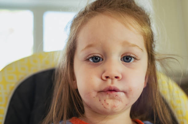 istock Girl Eating Breakfast 1036296918