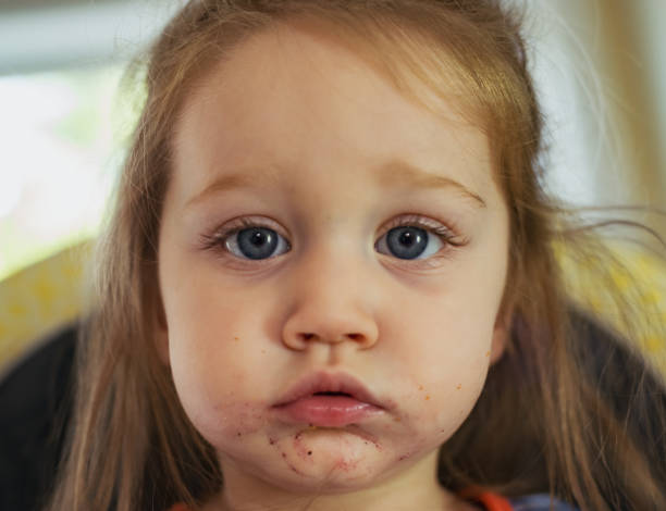 istock Girl Eating Breakfast 1036296946