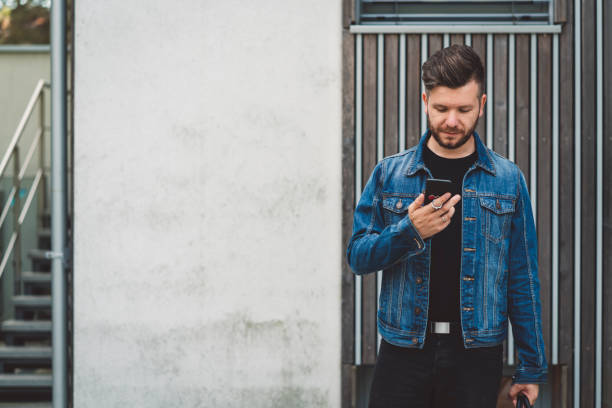 istock Business man using his phone outdoors 1036302070