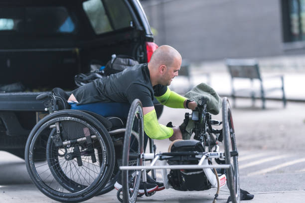 istock Adaptive athlete prepares to do a training ride on his handcycle 1036303648