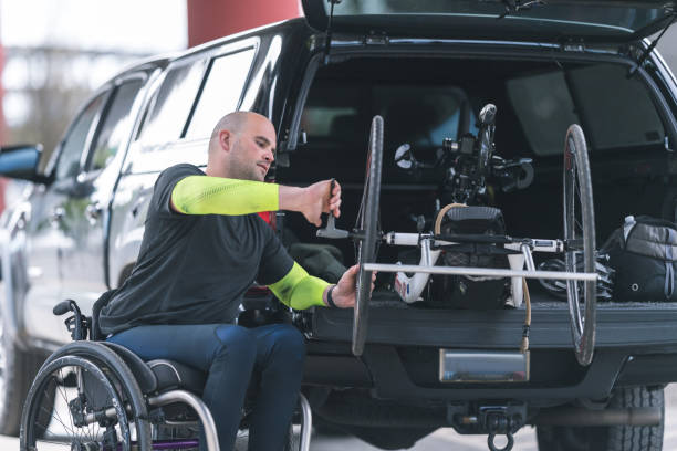 istock Adaptive athlete prepares to do a training ride on his handcycle 1036303660