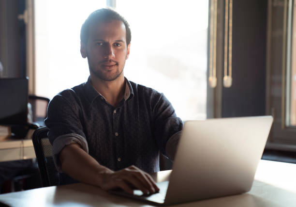istock Businessman Working on Laptop 1036312602