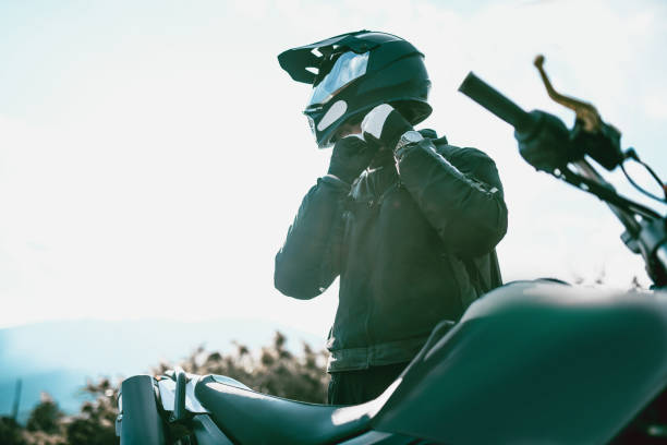 istock Motorcyclist With Specialized Equipment Getting Ready To Ride 1036316282