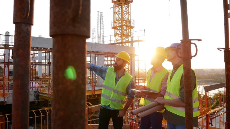 Experienced engineers working on the construction site