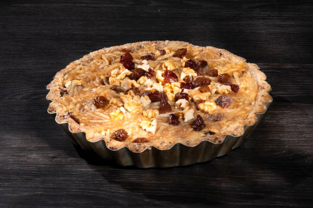 istock Raw vegan cake of apples, pears and walnuts. 1036327606