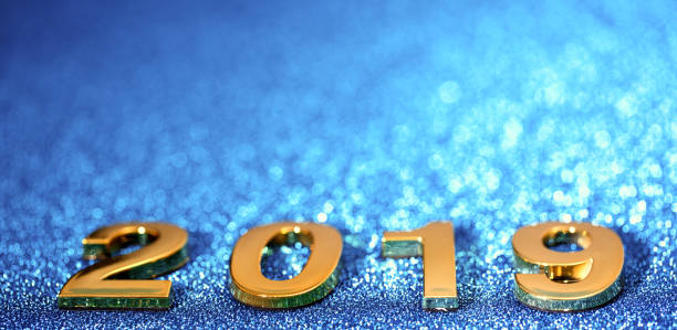 istock Golden New Year 2019 on a sparkling bokeh background (blue) 1036331790