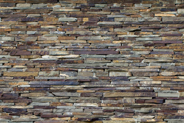istock Modern Multi Color Stone, slate travertine sandstone Wall used for Background 1036332806