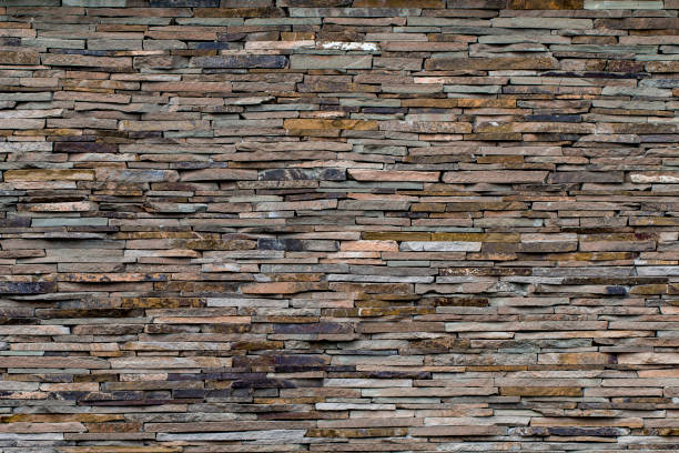istock Modern Multi Color Stone, slate travertine sandstone Wall used for Background 1036332810