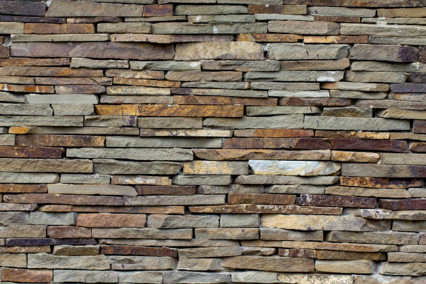istock Modern Multi Color Stone, slate travertine sandstone Wall used for Background 1036332850