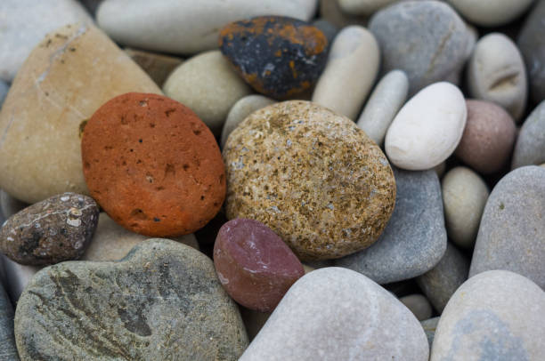istock boulders and colorful pebbles on the beach 1036340272