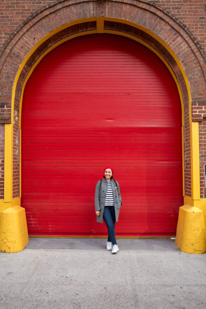 istock Woman posing on a red background 1036346470