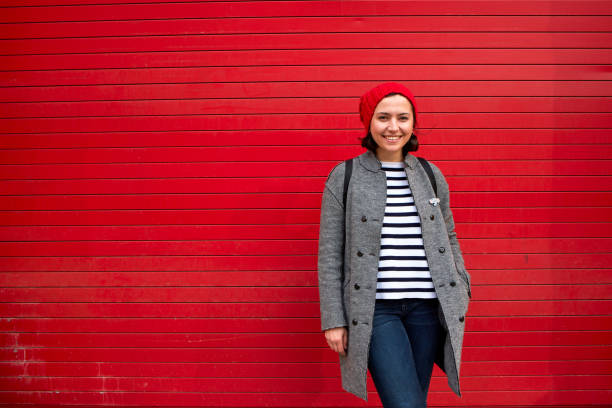istock Woman posing on a red background 1036346472