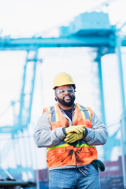 istock African-American dock worker at shipping port 1036350348