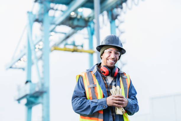 istock Mixed race Hispanic dock worker at shipping port 1036351610