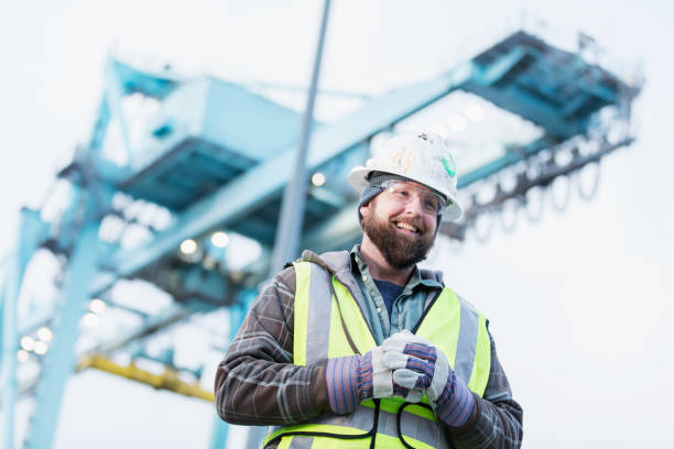 istock Dock worker at shipping port 1036352542