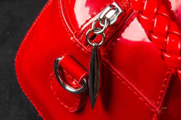 istock fittings on the leather hand bag, close up 1036354062
