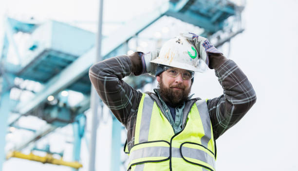 istock Dock worker at shipping port 1036356150