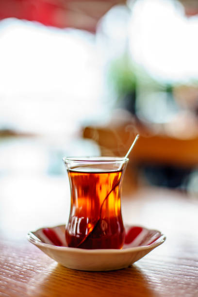 istock Turkish Tea on famous glass on wooden table in Bursa 1036360752