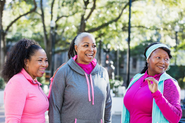 istock Three mature African-American women laughing 1036366008
