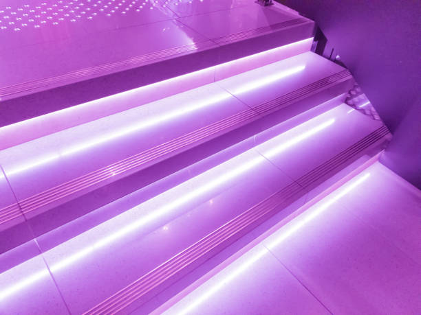 istock Stairs in the building in modern neon lighting. 1036369904