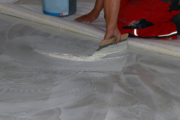 istock A floor layer lays a new carpet 1036383462