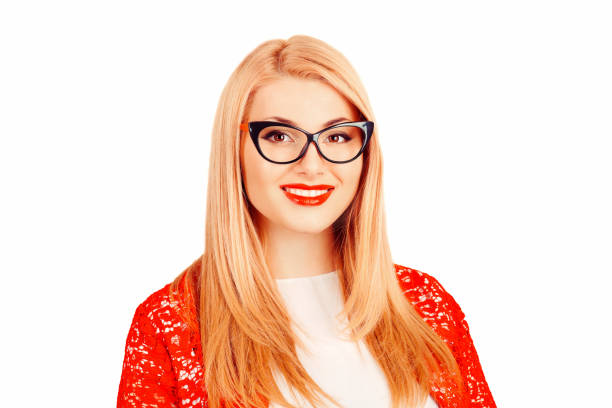 istock woman in glasses stands on a white background wall. Positive face expression. 1036385626
