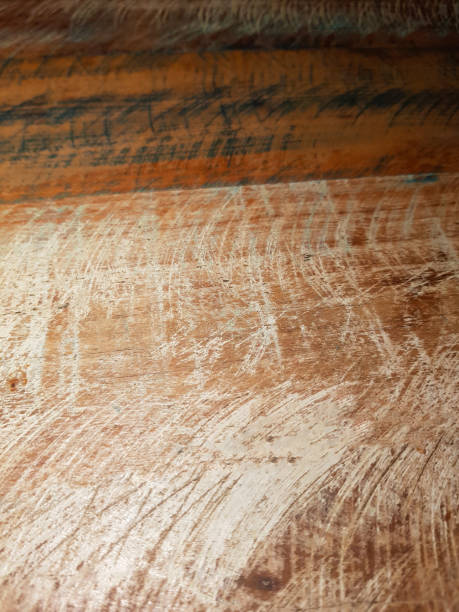 istock Texture in wood with colored scratches 1036386098