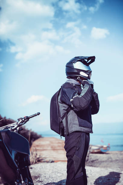 istock Motorcyclist With Specialized Equipment Arrived at Destination 1036397134
