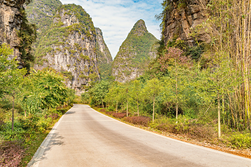 Road between the karst mountains near Yangshuo.