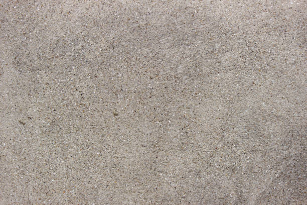 istock rock concrete abstract neutral beige wall background 1036401166