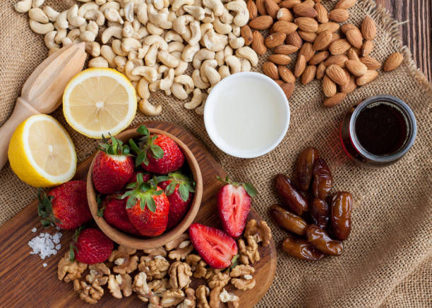istock Ingredients for raw strawberry cheesecake. 1036416850