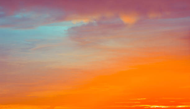 istock blue and orange sky clouds at sunset or sunrise. 1036431676