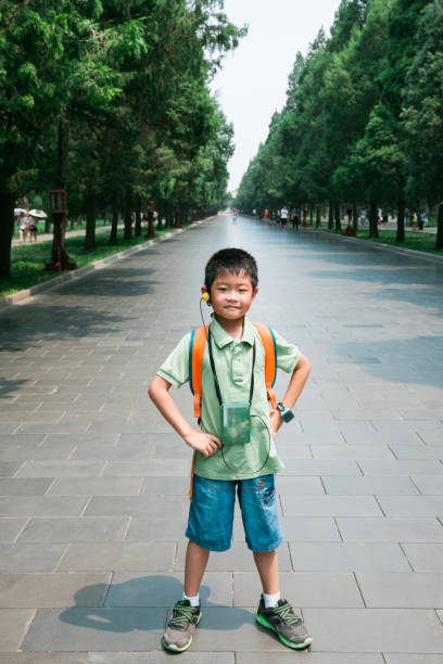 istock Asian boy visiting Temple of Heaven in vacation 1036473122