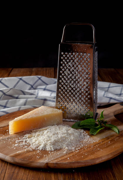 istock Freshly grated parmesan cheese on wooden 1036480158