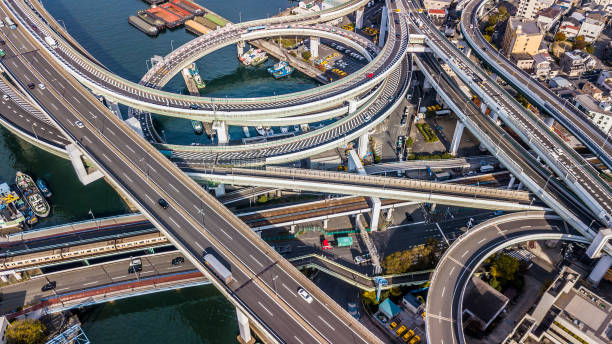 istock Osaka Expressway top view, Top view over the highway, expressway and motorway, Aerial view interchange of Osaka City, Expressway is an important infrastructure in Osaka City, Japan. 1036492956