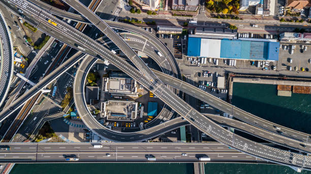 istock Osaka Expressway top view, Top view over the highway, expressway and motorway, Aerial view interchange of Osaka City, Expressway is an important infrastructure in Osaka City, Japan. 1036492970
