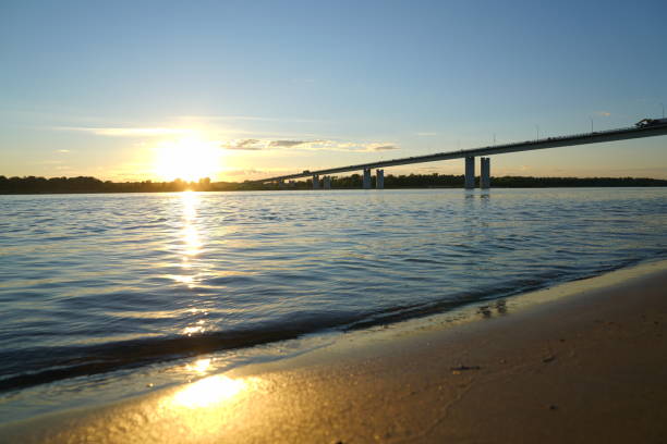 istock Sunset on the river with a gold 1036498256