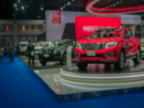 view of motor show exhibition blurred background