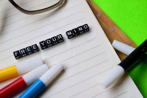 istock Free your mind message written on wooden blocks. 1036528472