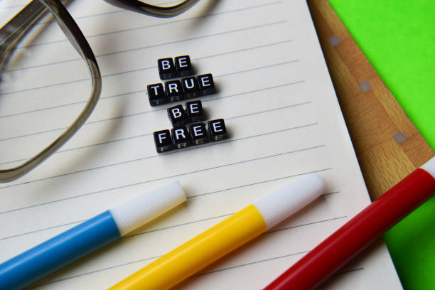 istock Be true be free message written on wooden blocks. 1036528682