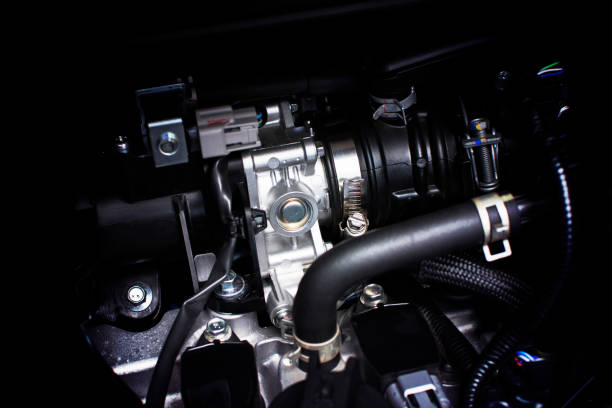 throttle body installed in gasoline part engine system. - throttle imagens e fotografias de stock