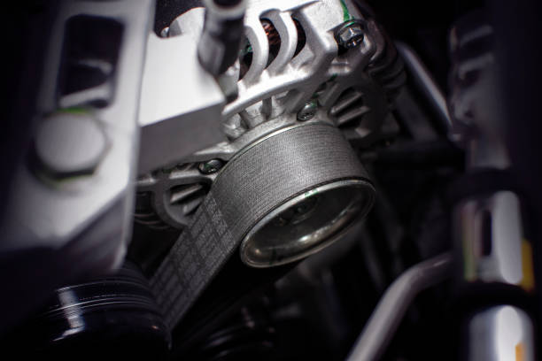 Timing belt of alternator. Timing belt of alternator in engine room of car, automotive part concept. spare part stock pictures, royalty-free photos & images