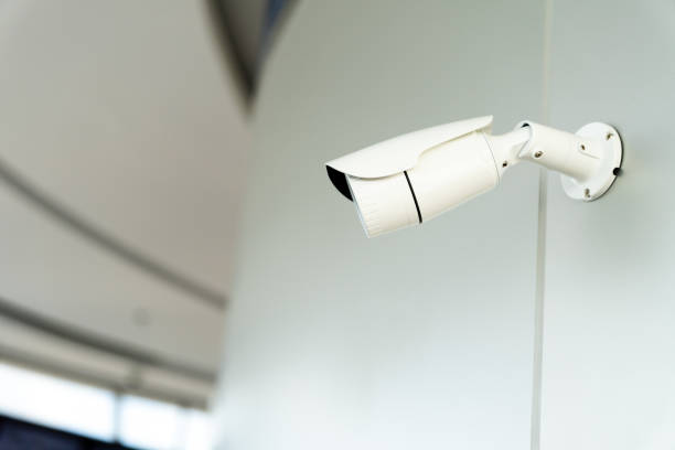 istock Security white CCTV (Closed-circuit television) camera in the office building. 1036537720
