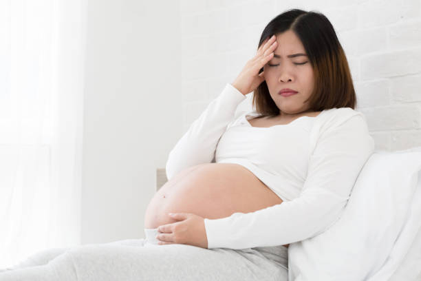 istock Pregnant women with the discomforts and feeling stressed during pregnancy 1036554254