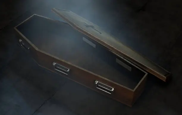 A slightly open empty wooden coffin with a metal crucifix and handles on a dark ominous background - 3D Render